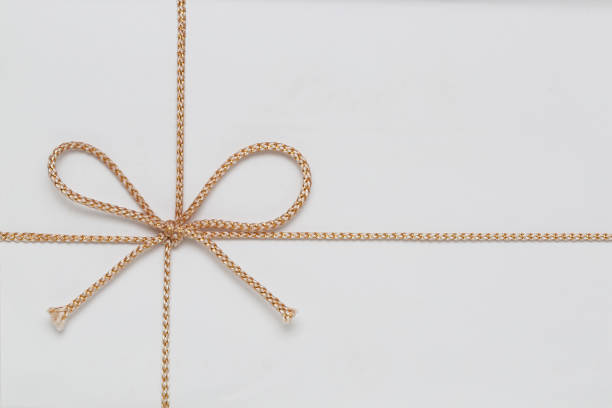 Gift String Bow Stock Photo - Download Image Now - Gold - Metal, String,  Gold Colored - iStock