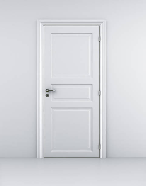 istock White door in a white room with white floors 93461874