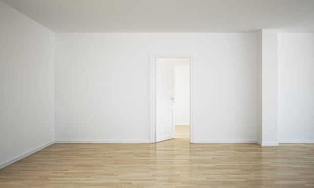 istock An empty room with hardwood floors 93462188