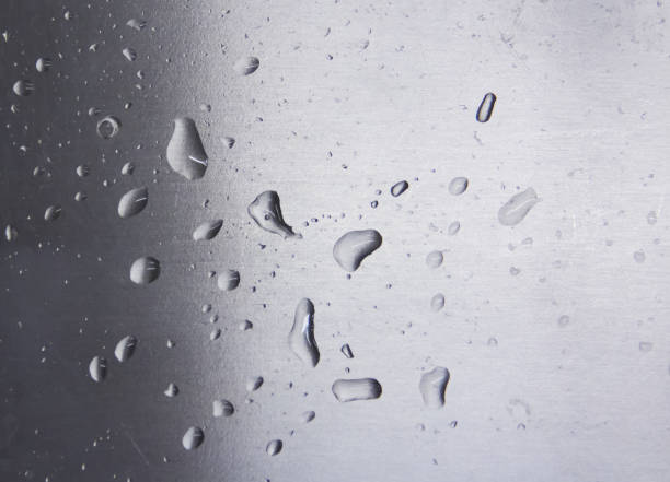 istock water droplets on a grey metallic surface of the sink 934623764