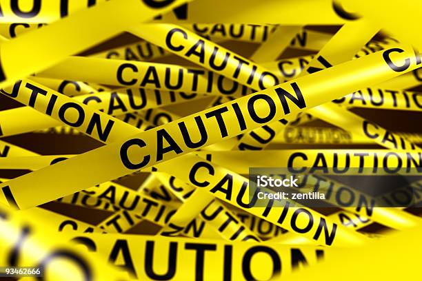 Several Yellow Caution Tapes Overload Stock Photo - Download Image Now - Barricade, Barricade Tape, Black Color