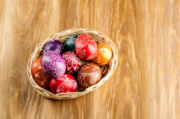 istock colorful scratched handmade Easter eggs on a wooden table 934633702