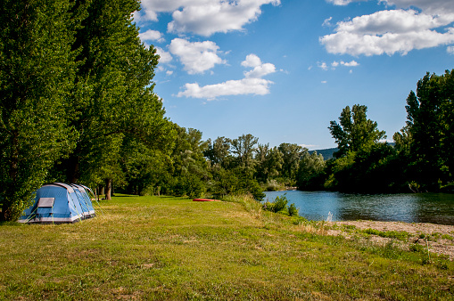 Tent and camping site near the river Ceze, Languedoc, France