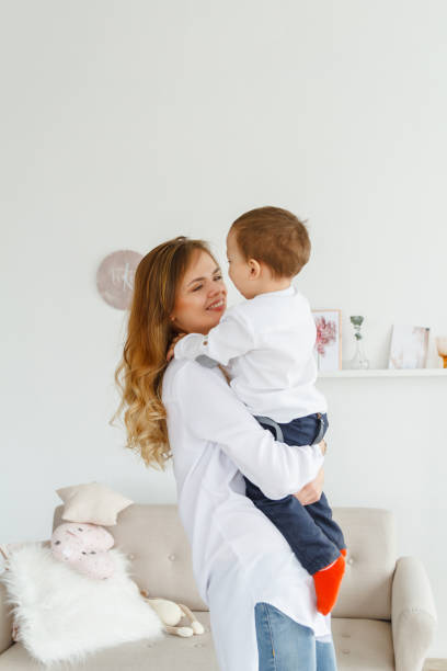 istock Mom and baby having fun at home 934639688