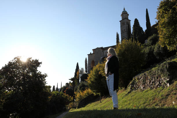istock Woman explores village in Switzerland 934646320