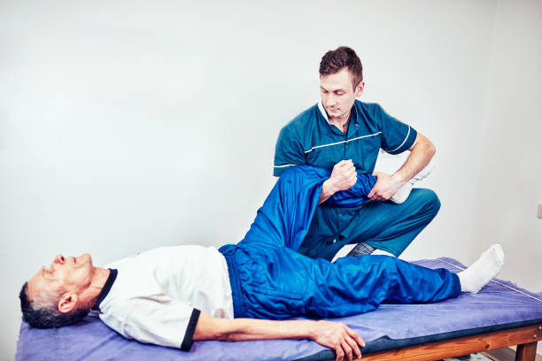 istock Physiotherapist treating a patient in a patient's office 934646790