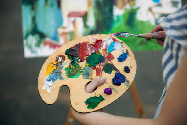 istock Palette with paints and spatula 934649114