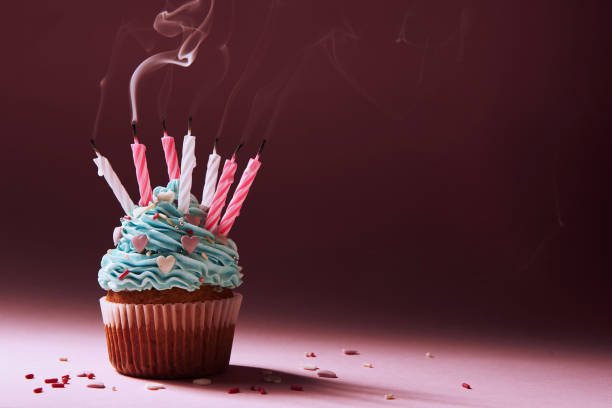 istock muffin with cream and candles 934652548