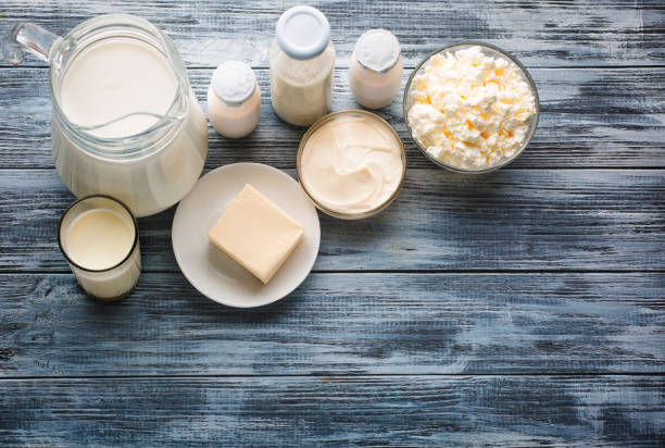 istock Dairy products grocery assortment on rustic wooden table 934658126