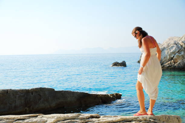 istock Young woman in a sea 934658192