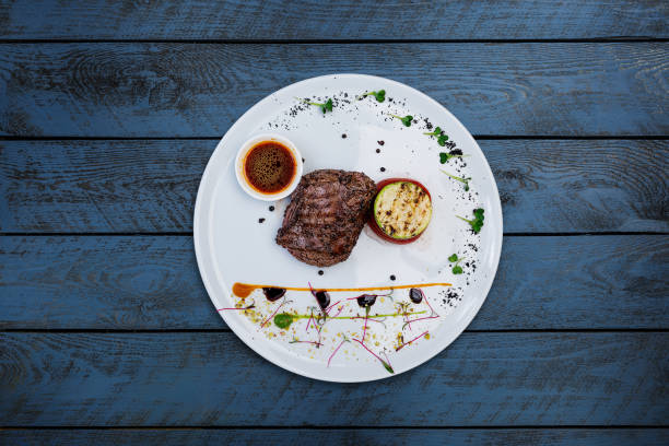 istock Steak pepper from veal with grilled vegetables. 934659690