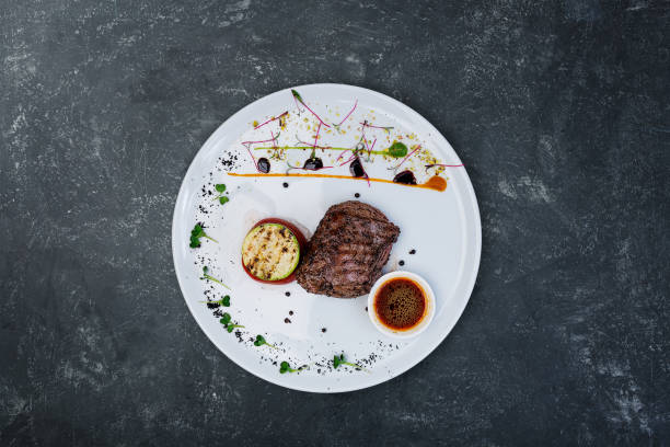 istock Steak pepper from veal with grilled vegetables. 934660344