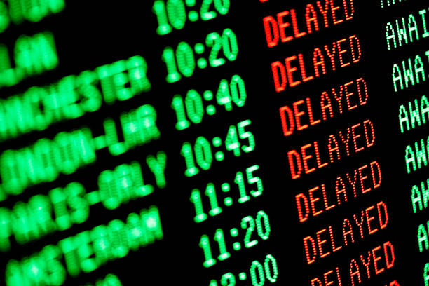 flight delays - delayed departures / arrivals screen  flying stock pictures, royalty-free photos & images