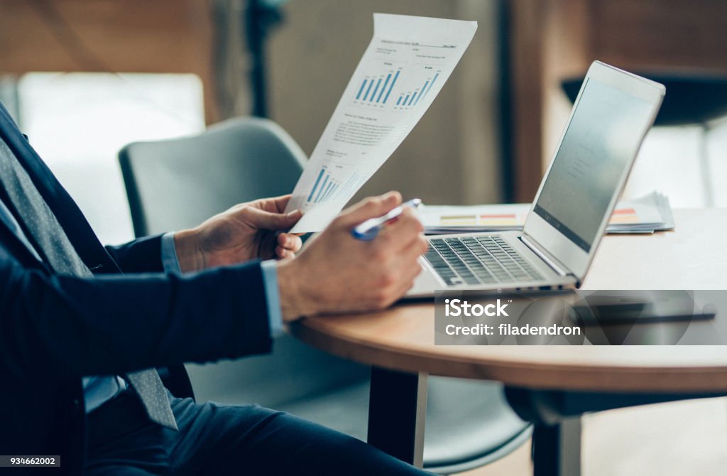 Hands of Businessman Notebook and documents working Accountancy Stock Photo