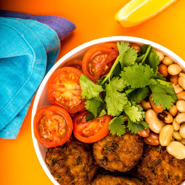 Vegetarian Falafel With Beans Coriander And Tomato Buddha Bowl