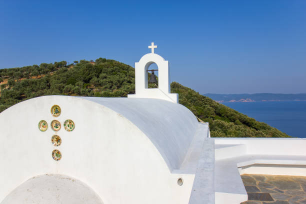 White orthodox church Agios Alexandros on the Skiathos island, Greece