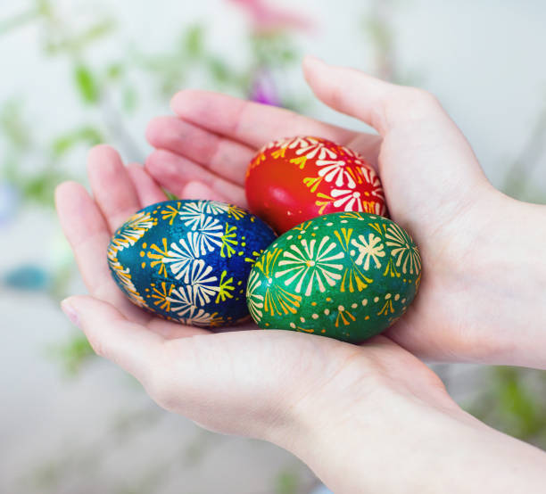istock Colorful easter eggs in girl hands. 934670518
