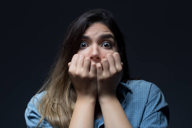 istock Woman Covering Her Mouth 934678944