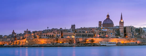 istock Panoramic skyline of illuminated Valletta in Malta 934679302