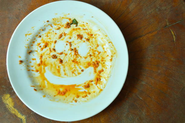 istock food stain with smiling face on white dish 934681906