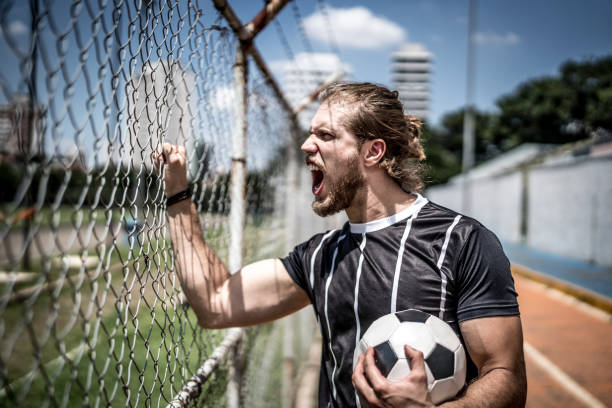 istock Fan watching a soccer game 934690596