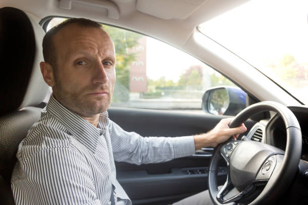 istock Stressed and annoyed male driver on the road during the rush hour 934697138