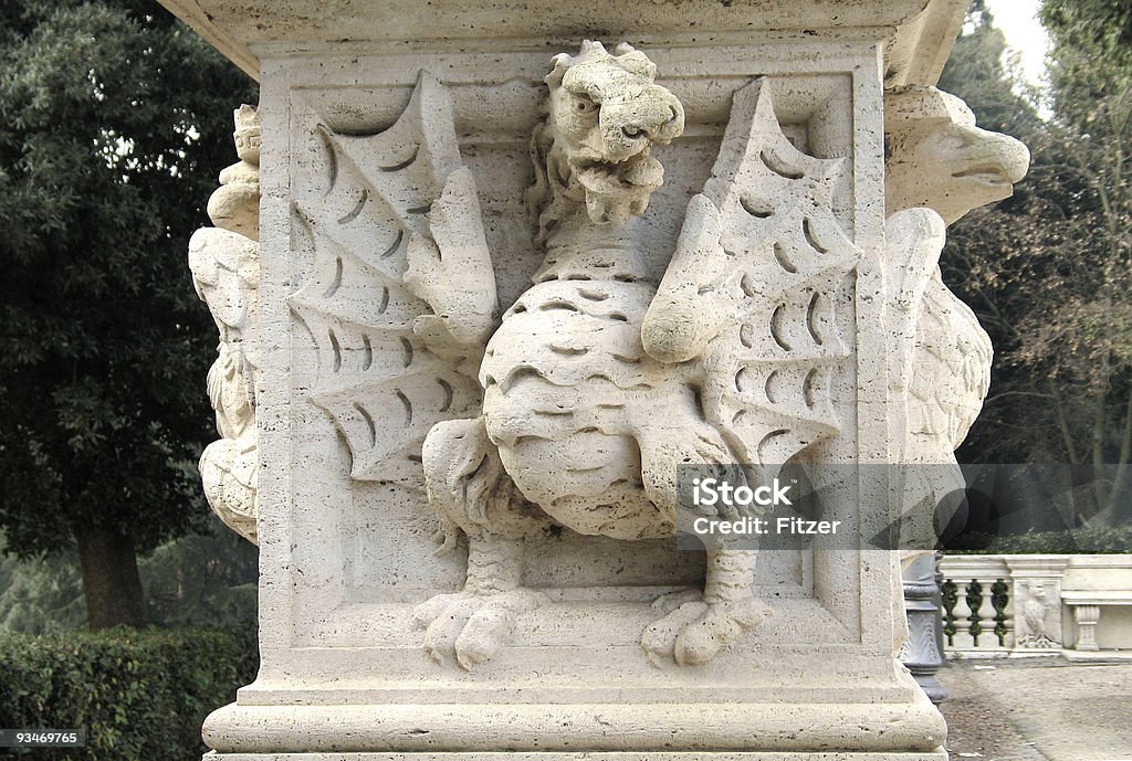 tongue out dragon dragon in rome out of sandstone... Animal Stock Photo