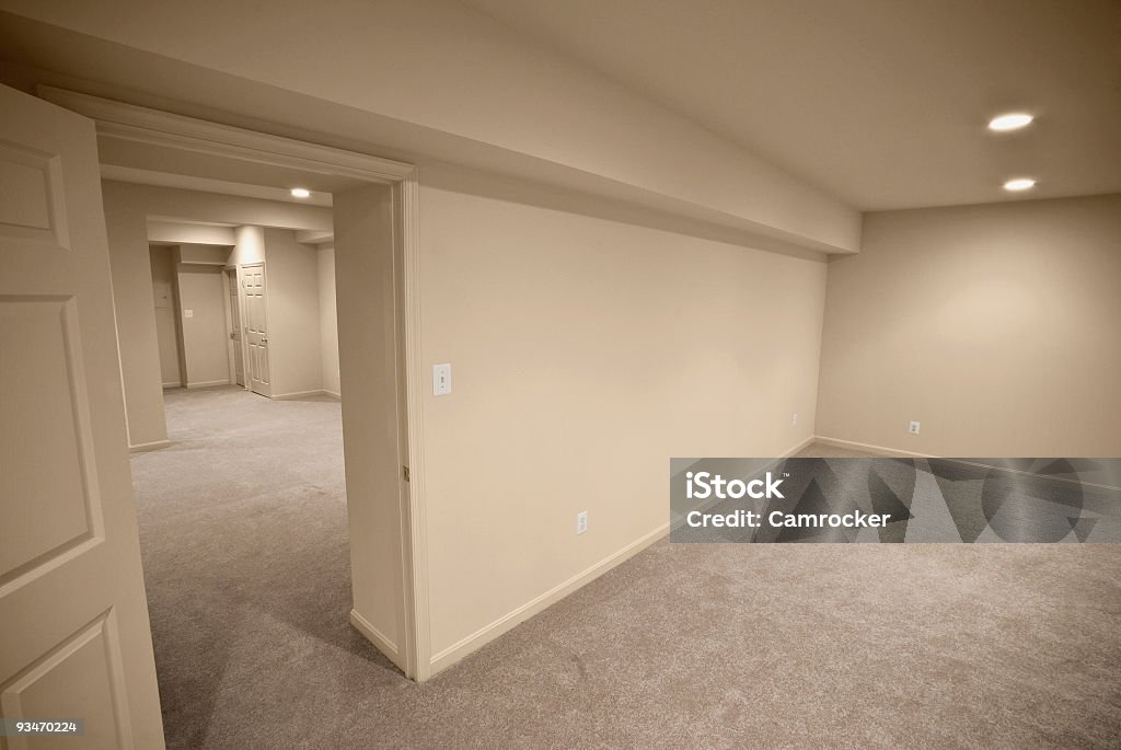 A completely beige interior of a house Oblique abstract view of a newly remodeled Suburban basement.
[url=http://www.istockphoto.com/file_search.php?action=file&lightboxID=4113921][img]http://farm3.static.flickr.com/2019/2492870375_dbc144af36.jpg?v=0[/img][/url]
 Basement Stock Photo