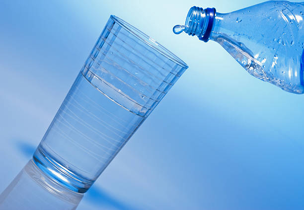 istock Pouring water into a glass 93470354