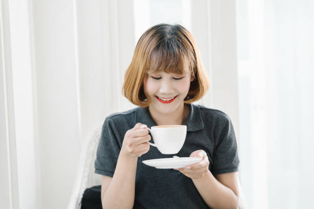 istock Young Businesswoman Having a Coffee Break. 934707136