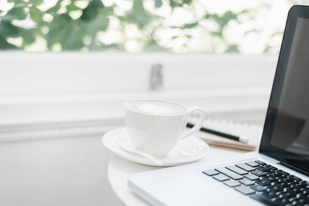 istock Laptop with coffee cup home office. 934711410