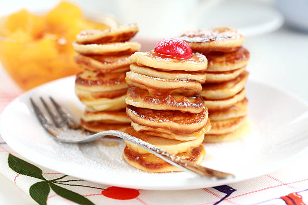 istock A pile of mini sweet pancakes on a plate 93471339