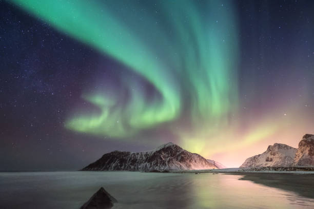istock Northen light under mountains. Beautiful natural landscape in the Norway 934714270
