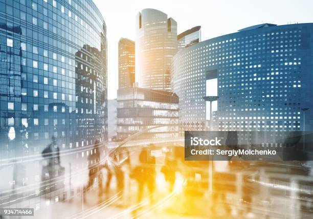 Multiple Exposure Of Silhouettes Of People Walking In The Street Near Skyscrapers And Modern Office Buildings In Paris Business District Multiple Exposure Blurred Image Economy Finances Business Concept Illustration Stock Photo - Download Image Now