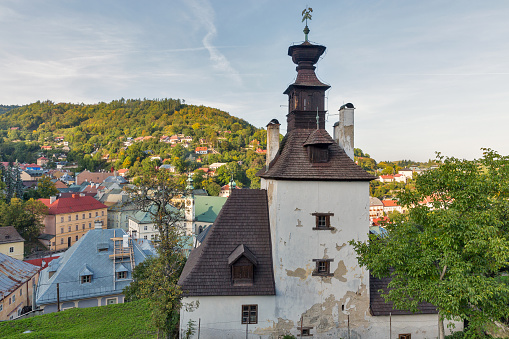 Banska Stiavnica townscape with knocking tower or tea house in the foreground, Slovakia.