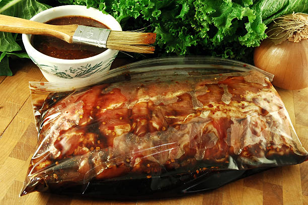 Marinating Ribs  marinated photos stock pictures, royalty-free photos & images