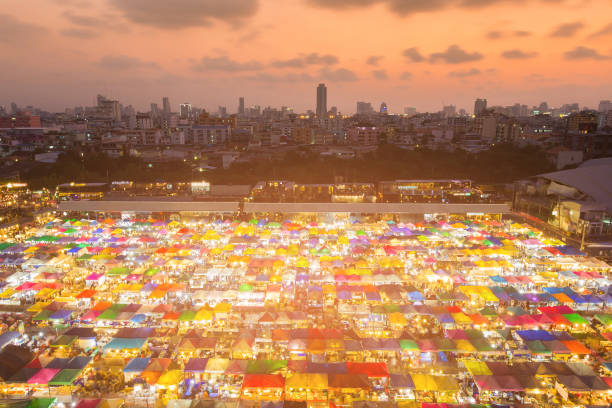 istock Top view flea weekend market with city downtown 934721266