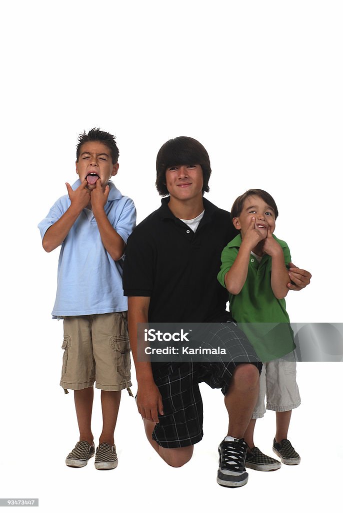 Trzech chłopców - Zbiór zdjęć royalty-free (Białe tło)