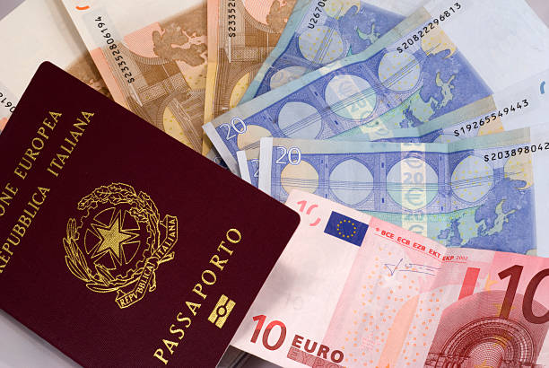 istock money and passport 93473969