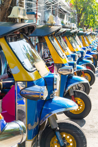 tuk tuk thailand is local taxi thai is favorite activities and attraction of tourists in bangkok, thailand - jinrikisha thailand tuk transportation imagens e fotografias de stock