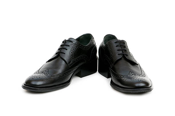 istock Black shoes isolated on the white background 93474876