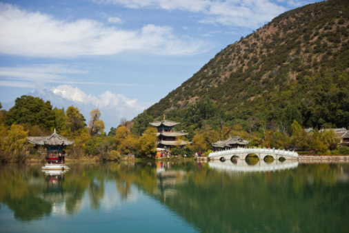 Sunset at the Hyangwonjeong Pavilion in the center of the pond in the Gyeongbokgung palace, Seoul, South Korea.