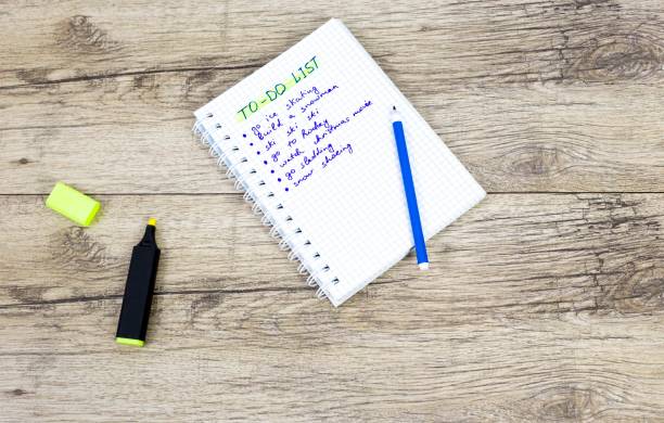 istock winter to-do lists with markers on wooden backround. 934765326