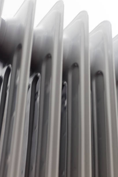 istock View from left below at oil electric radiator heater on white background. 934765526