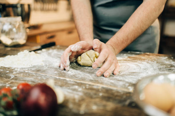 istock Homemade pasta cooking, dough preparation on table 934765654