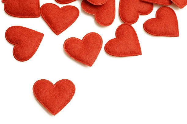 Illustration of several red hearts over a white background Small red hearts on white felt heart shape small red stock pictures, royalty-free photos & images