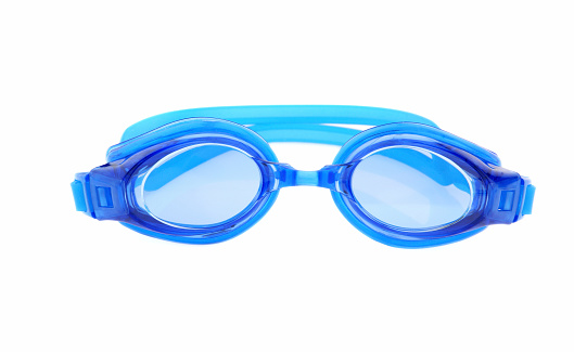 Sunglasses with a transparent frame and blue lenses on a blue paper background. Plastic glasses front view.