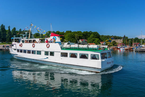 istock Passenger boat with tourists heading into Visingso Harbour in Sweden 934778034