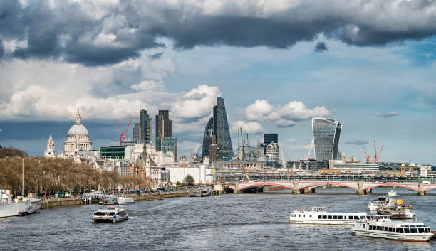 istock Beautiful landscape image view from Waterloo bridge along River Thames towards financial district in London 934781780