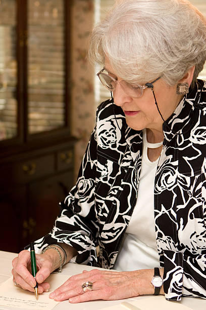 istock Senior Woman Writing Letter 93478552